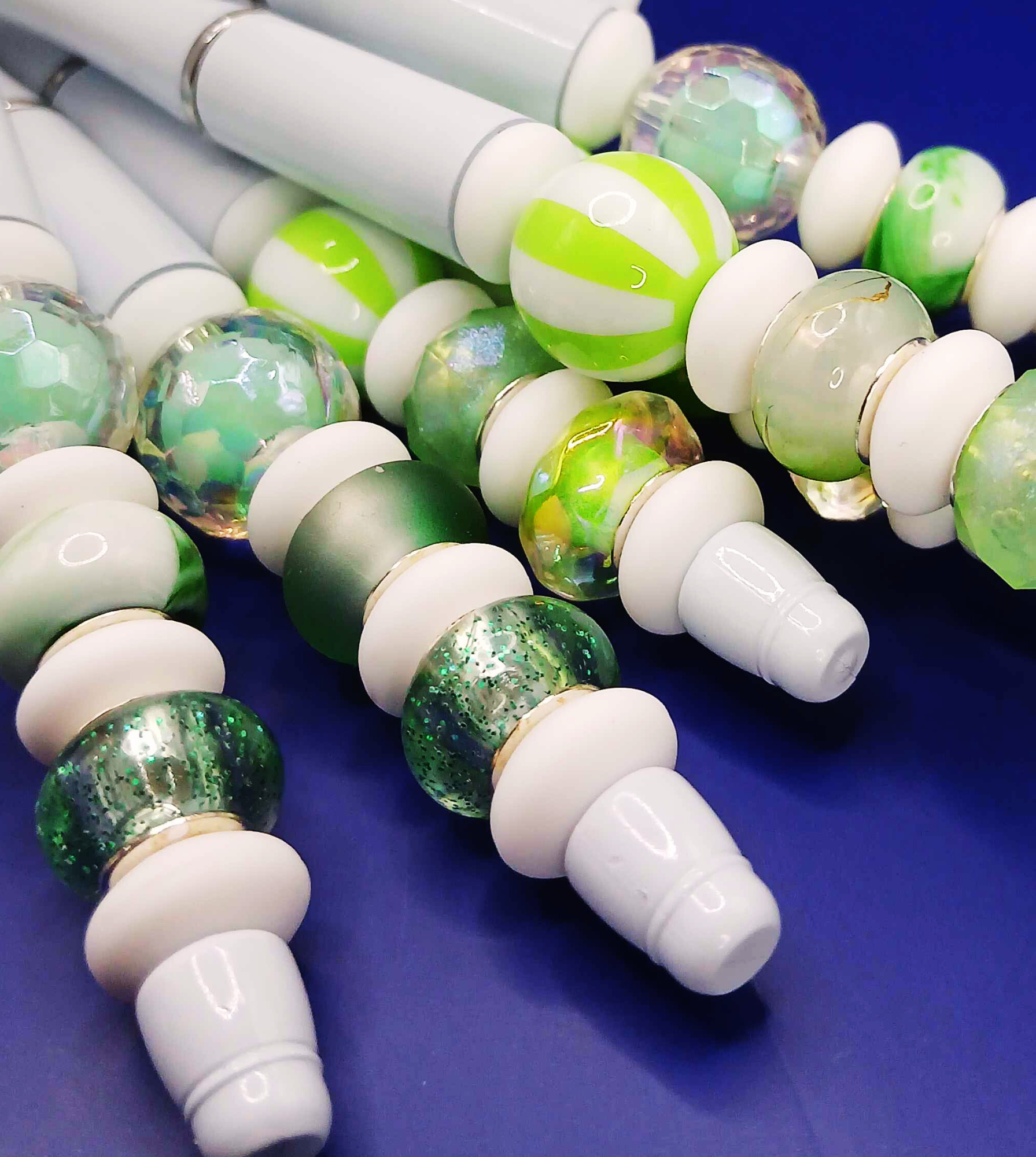 Showcase of handcrafted green pens 1